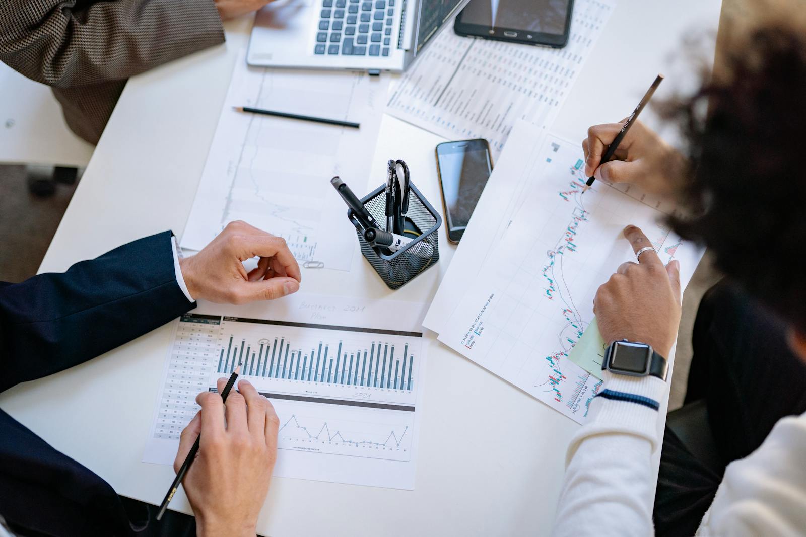 Business professionals collaborating around a table